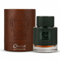 Al Shabaab Qaared perfume bottle and its brown leather-textured cylindrical box, featuring an embossed ornate crest and silver branding on a white background.