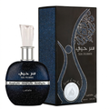 A bottle of Ser Hubbee perfume next to its retail box. The bottle is dark blue with a glittery texture, a silver neck, and a clear faceted cap.