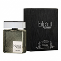 A bottle of Sugarrat Lattafa perfume next to its black textured packaging box, featuring white Arabic and English text on a clean white background.